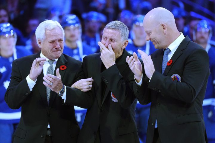 Former Toronto Maple Leafs players and members of the Hockey Hall of Fame, Darryl Sittler, left to right, Borje Salming and Mats Sundin take part in a pregame ceremony prior to NHL hockey action between the Toronto Maple Leafs and Pittsburgh Penguins, in Toronto, Friday, Nov. 11, 2022.