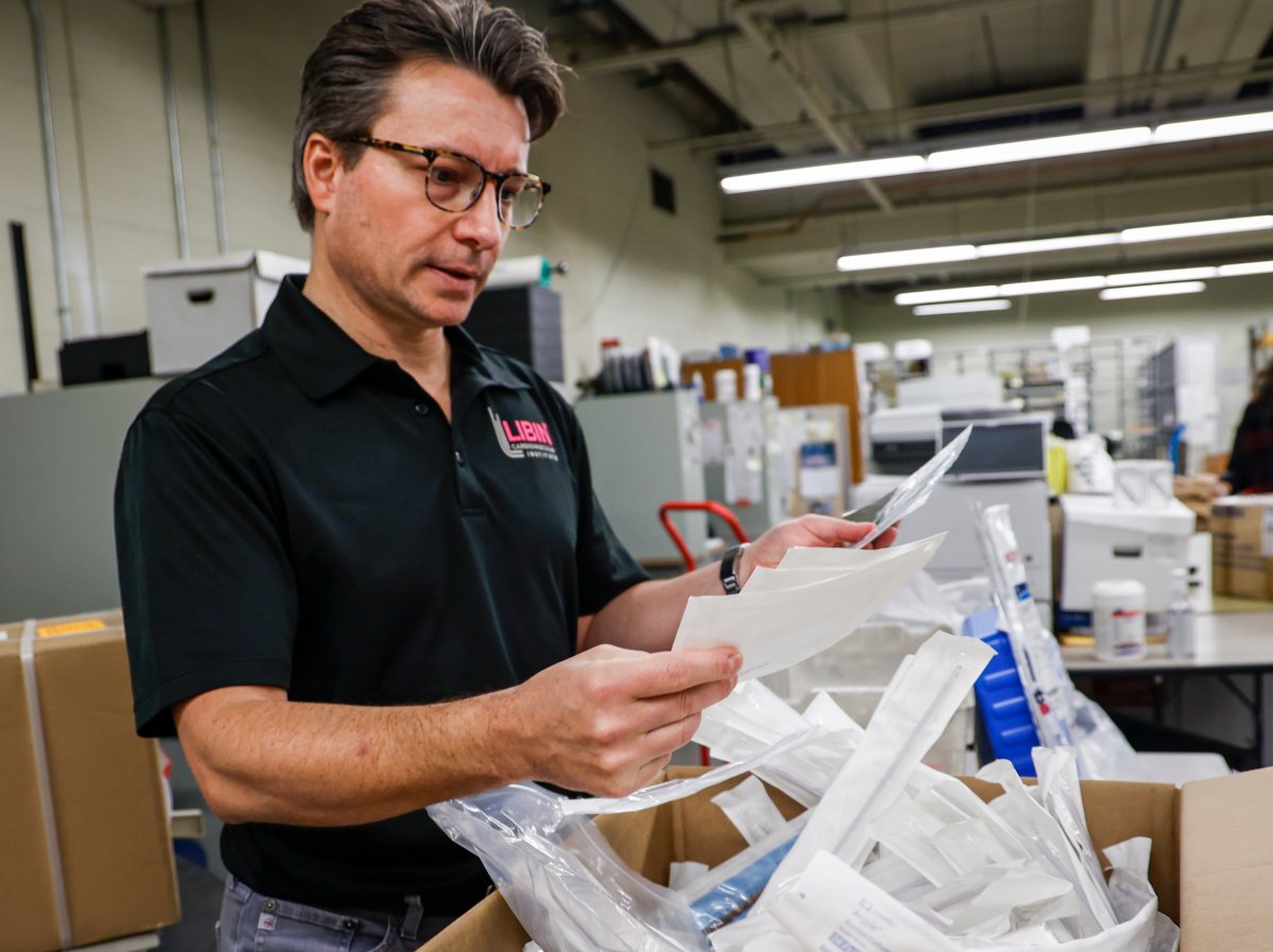 Dr. Paul Fedak sorts through medical and surgical supplies destined for the Ukraine at the Foothills Medical Centre in Calgary, Alta., Thursday, Nov. 17, 2022.