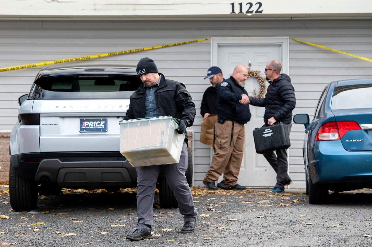 Officers investigate the deaths of four University of Idaho students at an apartment complex south of campus on Monday, Nov. 14, 2022, in Moscow, Idaho. The Moscow Police Department has labeled the deaths as homicides but maintains there is not an active risk to the community.