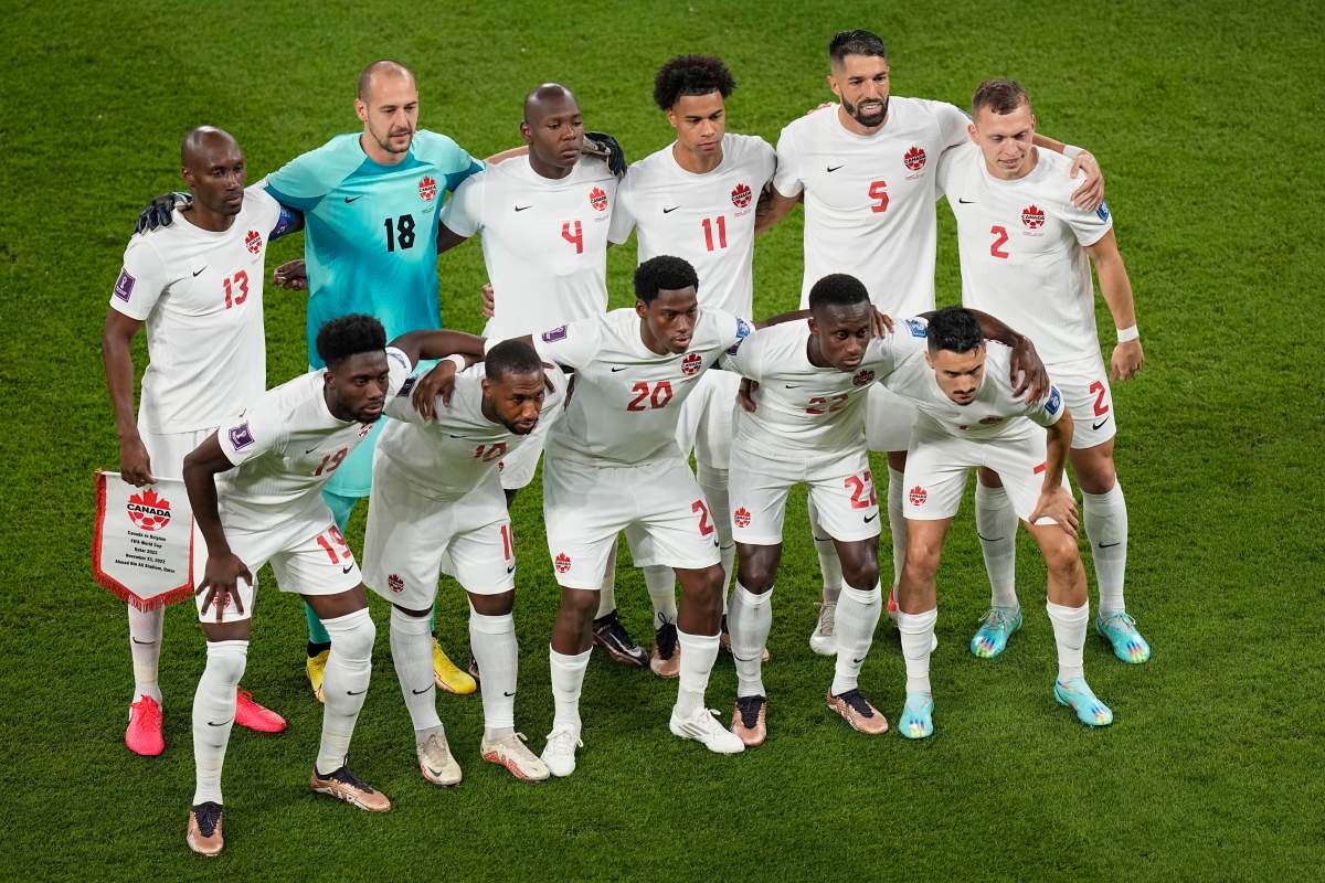 The team from Canada poses before the World Cup group F soccer match between Belgium and Canada, at the Ahmad Bin Ali Stadium in Doha, Qatar, Wednesday, Nov. 23, 2022.