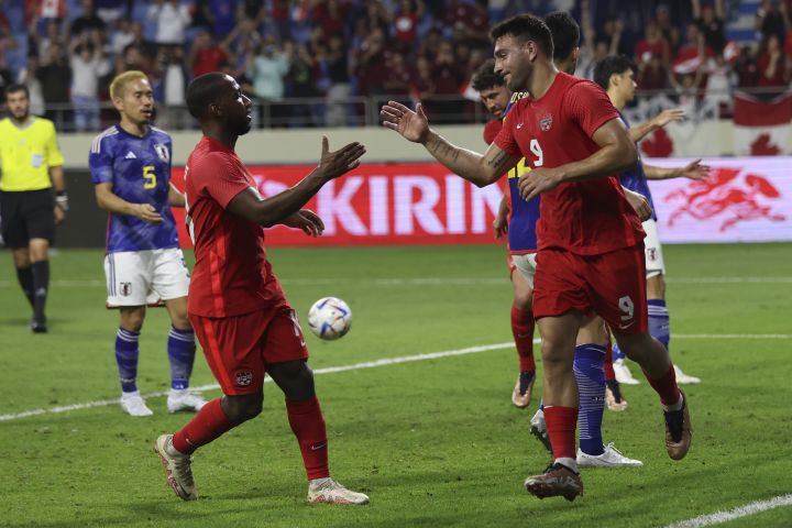 Canada’s Lucas Cavallini celebrates after he scored from a penalty kick during a friendly soccer match between Canada and Japan in Dubai, Thursday, Nov. 17, 2022.