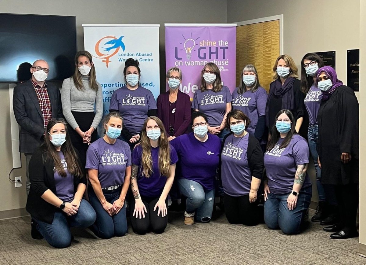 London Abused Womens Centre (LAWC) advocates and counsellors honour Wear Purple Day in support of the Shine the Light campaign.