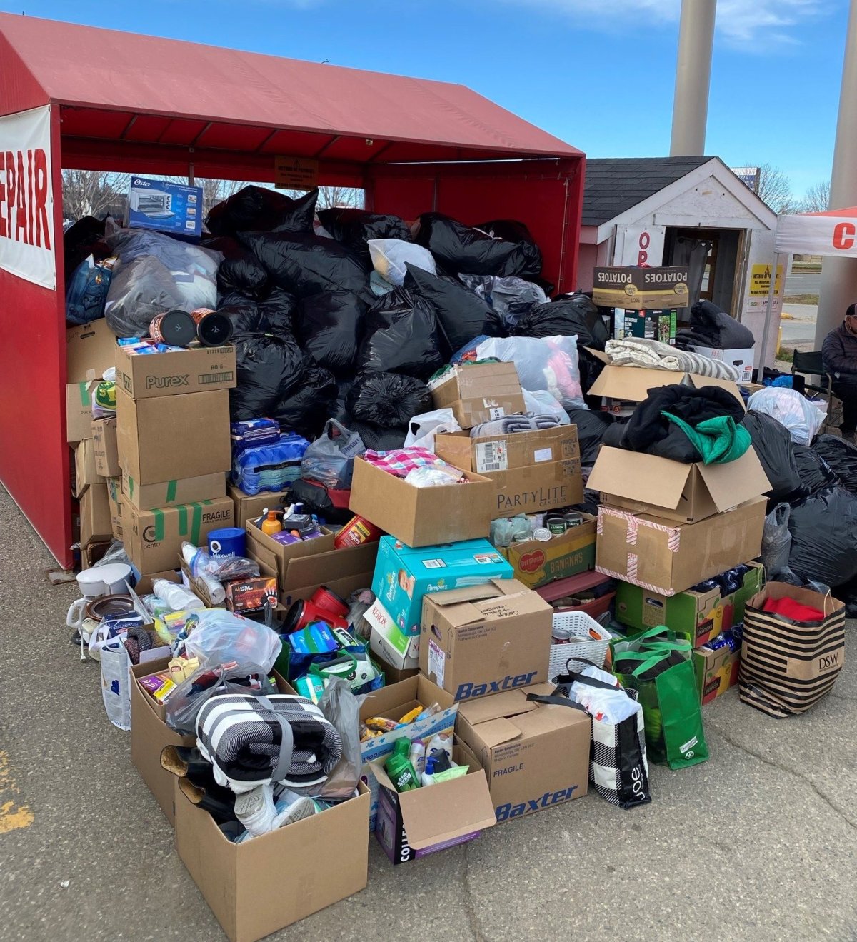 A local business hosts an event to fill a tent with donated items from winter coats to toiletries and taken to Awasiw where they will be distributed to those in need.