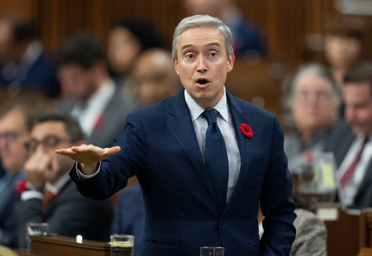 Innovation, Science and Industry Minister Francois-Philippe Champagne rises during Question Period on October 31, 2022 in Ottawa. Champagne is ordering three Chinese mining companies to sell their interests in Canadian critical mineral firms following a national security review. 