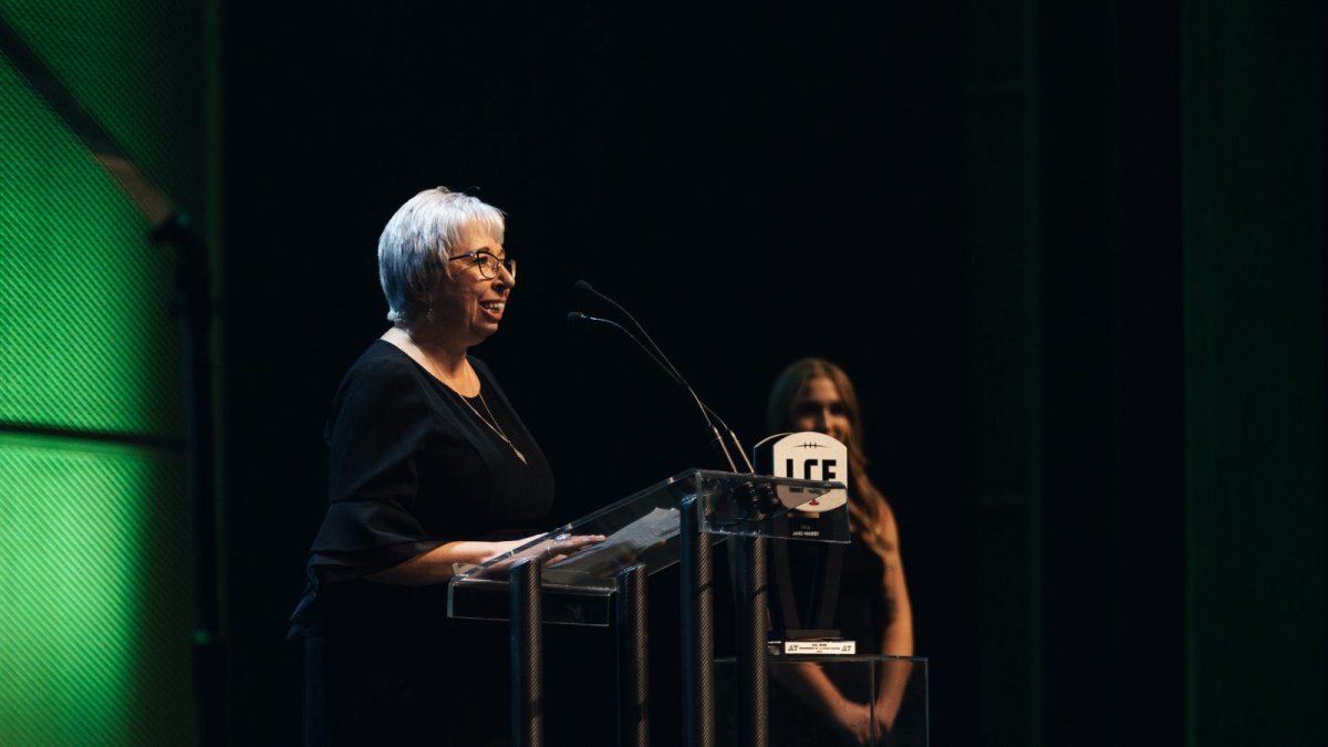 Gail Mund can be seen at the 2022 CFL Awards accepting the Jane Mawby Tribute Award.