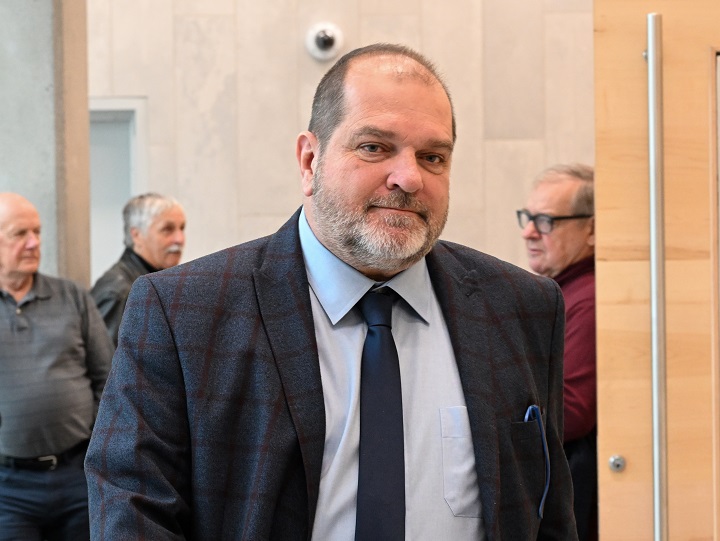 Former Parti Quebecois MNA Harold LeBel walks out of the courtroom during a break at the courthouse, in Rimouski, Que., Monday, Nov. 14, 2022. LeBel, who face charges of sexual assault, is testifying at his trial. 