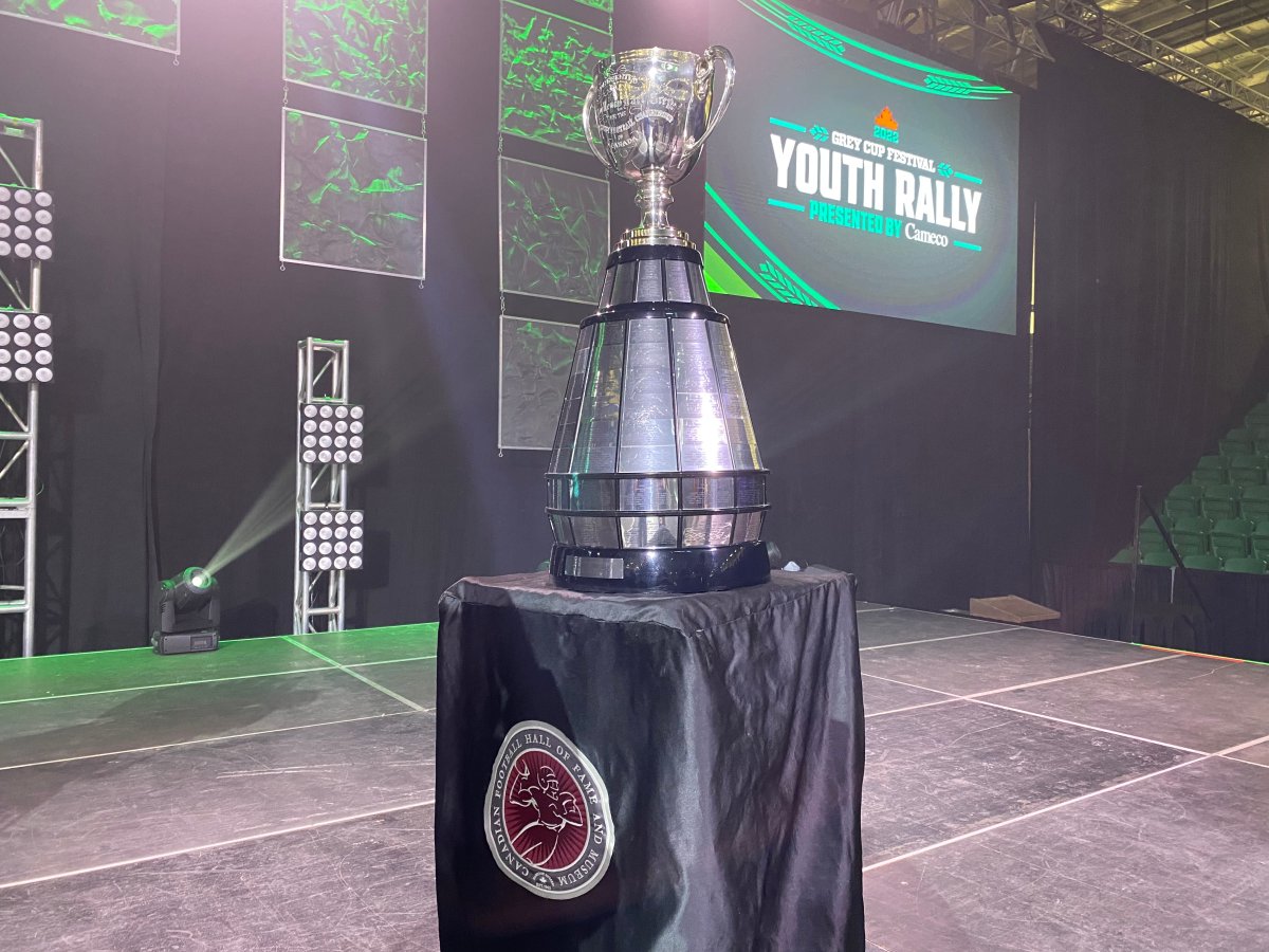 Grey Cup trophy arrives at the festival's Youth Rally in Saskatoon Wednesday. 
