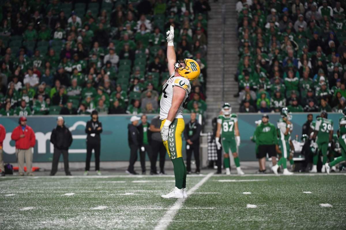 Elks DT Jake Ceresna points to the sky after a sack