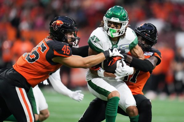 Kian Shaffer-Baker breaks a tackle in Week 12 against the BC Lions.