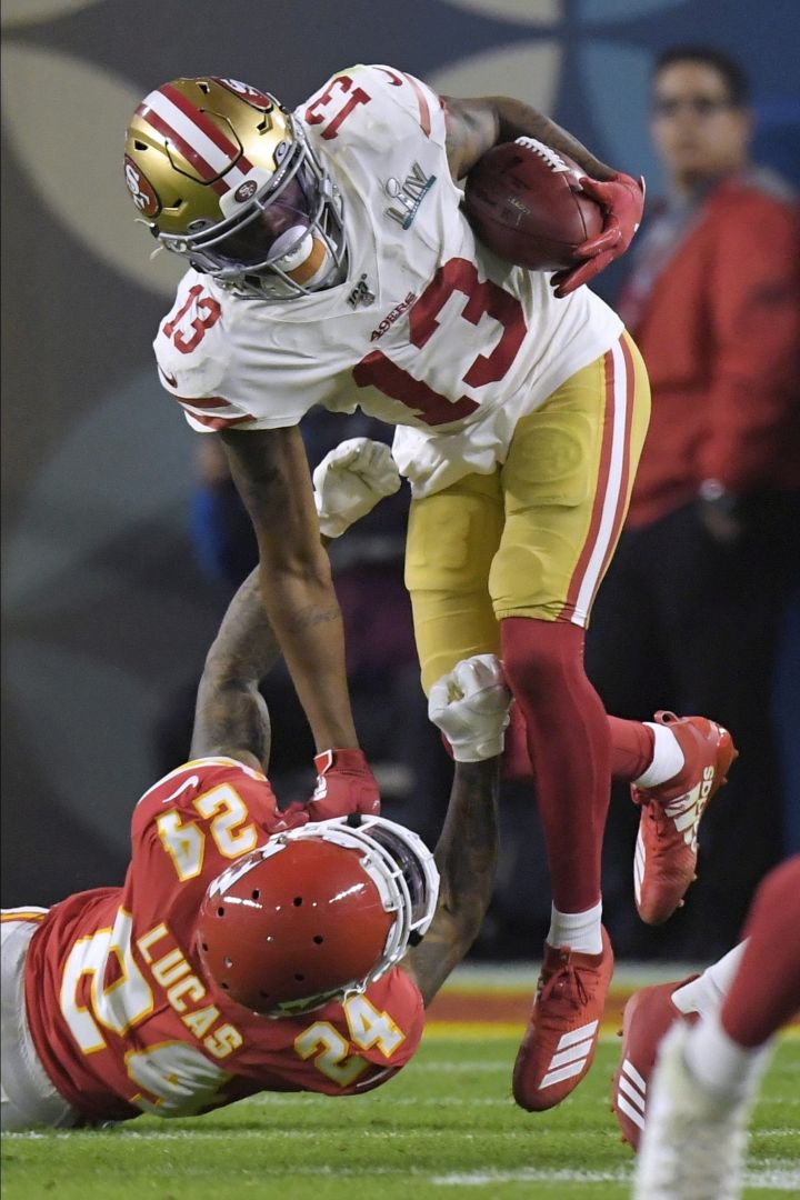 Kansas City Chiefs Jordan Lucas, left, tackles San Francisco 49ers Richie James during the second half of the NFL Super Bowl 54 football game Sunday, Feb. 2, 2020, in Miami Gardens, Fla.