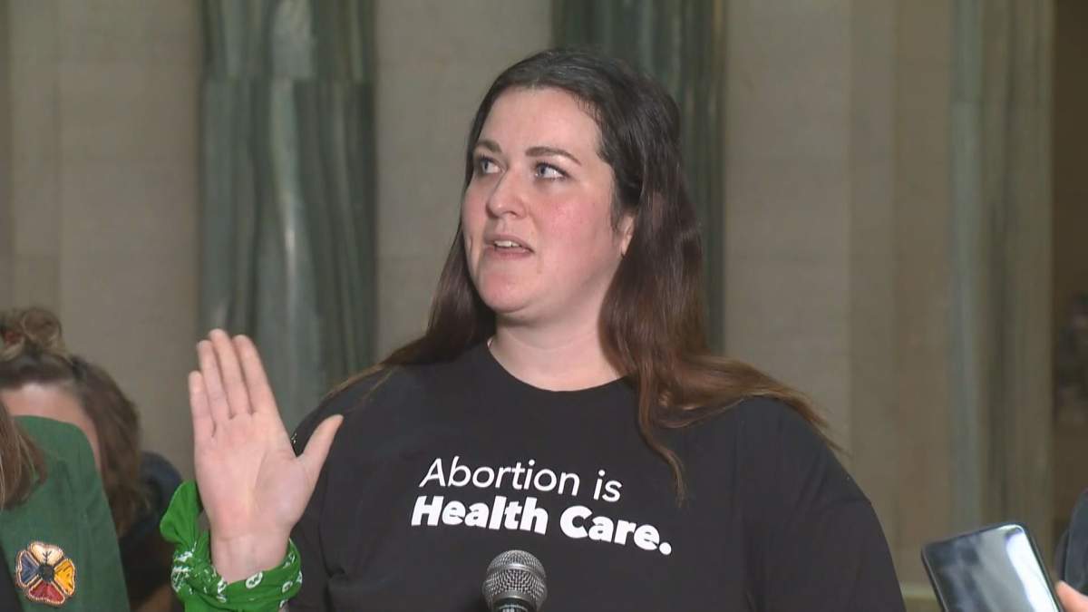 Megan Johnston was attending a women's rally Wednesday outside the Saskatchewan Legislative Building. 