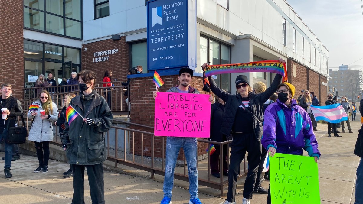 Counter-protesters gathered outside a Hamilton public library to oppose a handful protestors demonstrating against a drag queen storytime on Nov. 24, 2022.