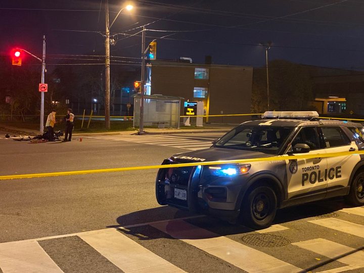 Police on the scene of a collision involving a motorcycle in Toronto on Nov. 1.