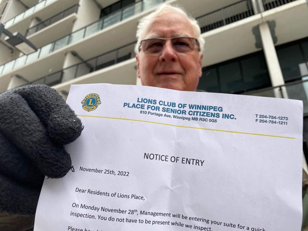 Gerald Brown holds up a letter sent to residents at Lions Place announcing the pending sale of the building.