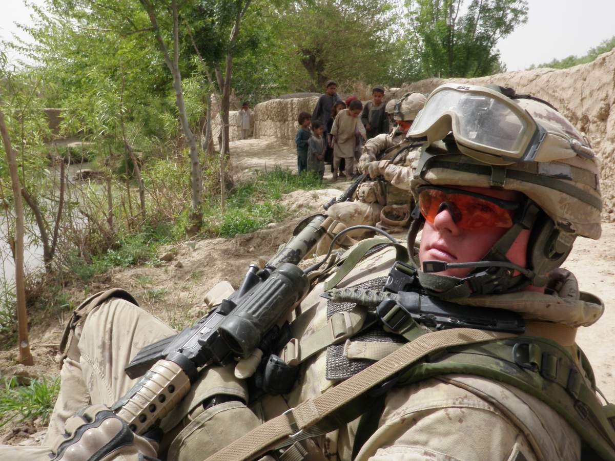 Jeremy Burns, now a Toronto police constable, is pictured while on previous military deployment.