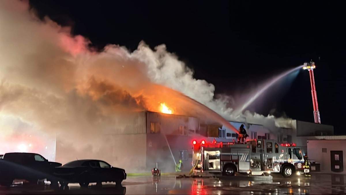 Fire crews battle a blaze at the Morinville Plaza Hotel and Suites Sunday, Nov. 6, 2022.