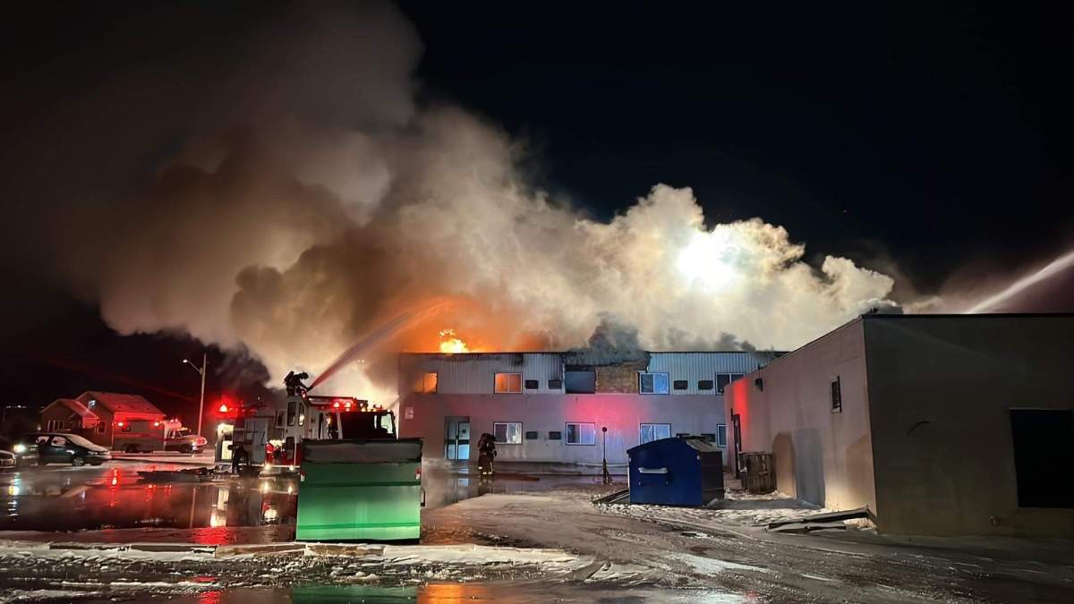Fire crews battle a blaze at the Morinville Plaza Hotel and Suites Sunday, Nov. 6, 2022.