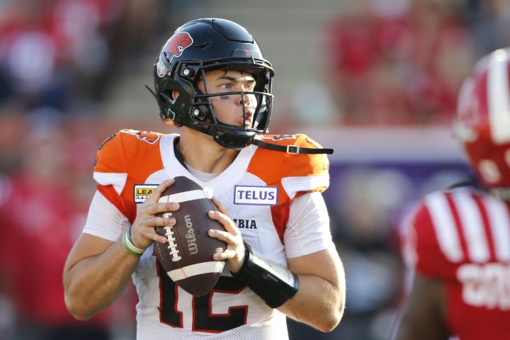 BC Lions quarterback Nathan Rourke looks downfield during second half CFL football action against the Calgary Stampeders in Calgary, Saturday Aug. 13, 2022. 