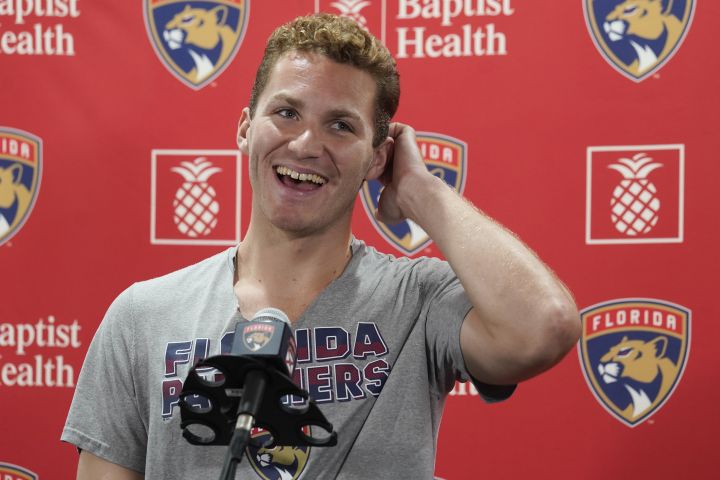 Florida Panthers’ Matthew Tkachuk smiles during the NHL hockey team’s media day, Wednesday, Sept. 21, 2022, in Coral Springs, Fla.