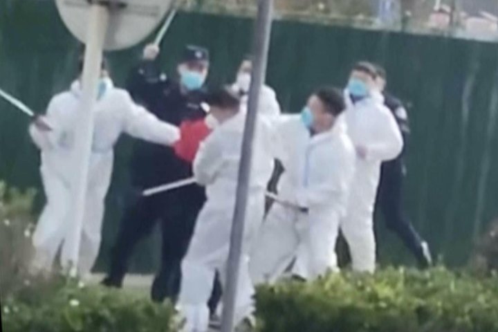 iPhone plant workers in China beaten by police during revolt over COVID, pay