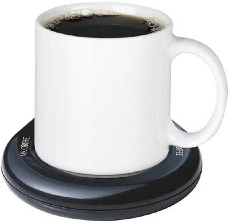 A white mug on a black, electric coffee warmer