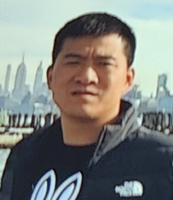 Ding Ping Wang, 31, was fatally shot on Saturday.