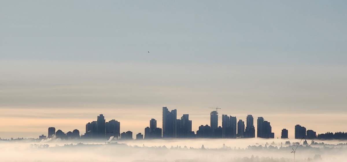 Downtown Vancouver in fog seen from North Vancouver.