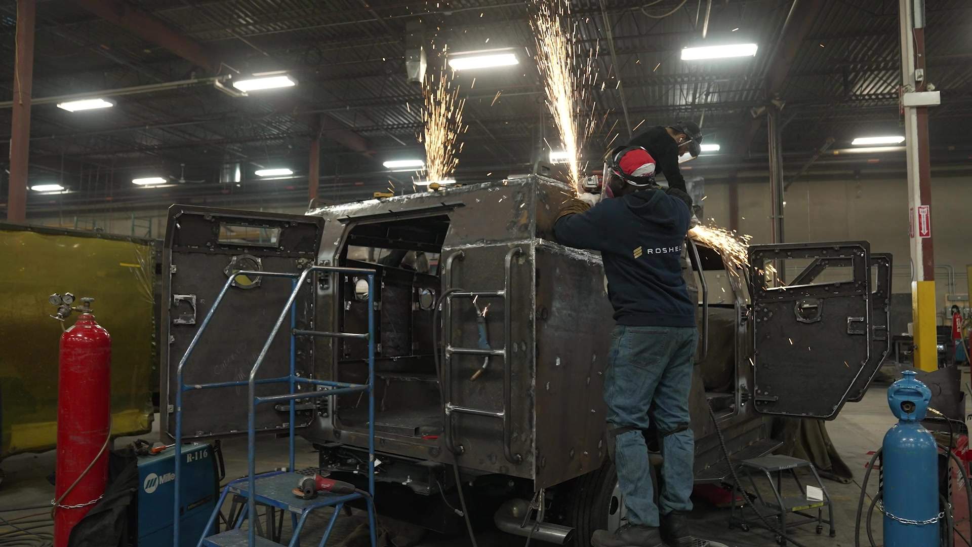 Workers at the Roshel plant building a Senator armoured personnel carrier.