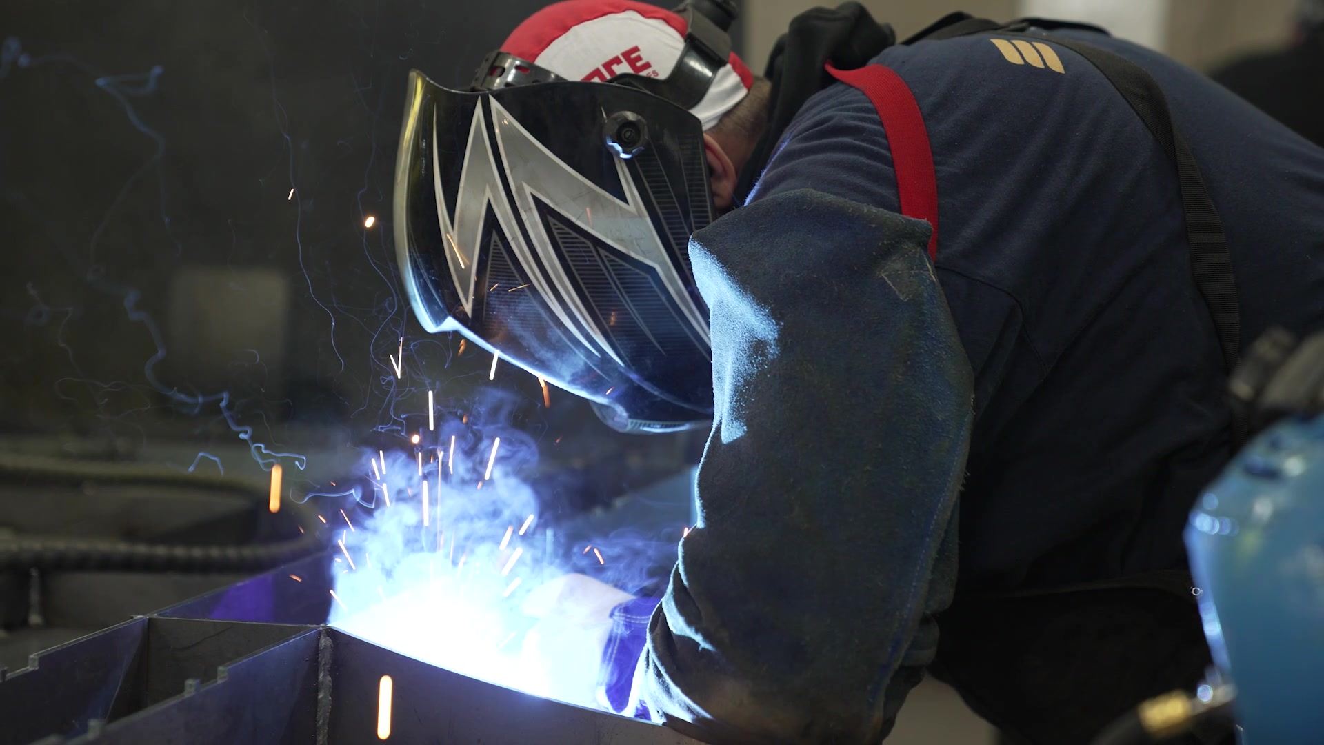 Volodymyr welding on Roshel’s production line.