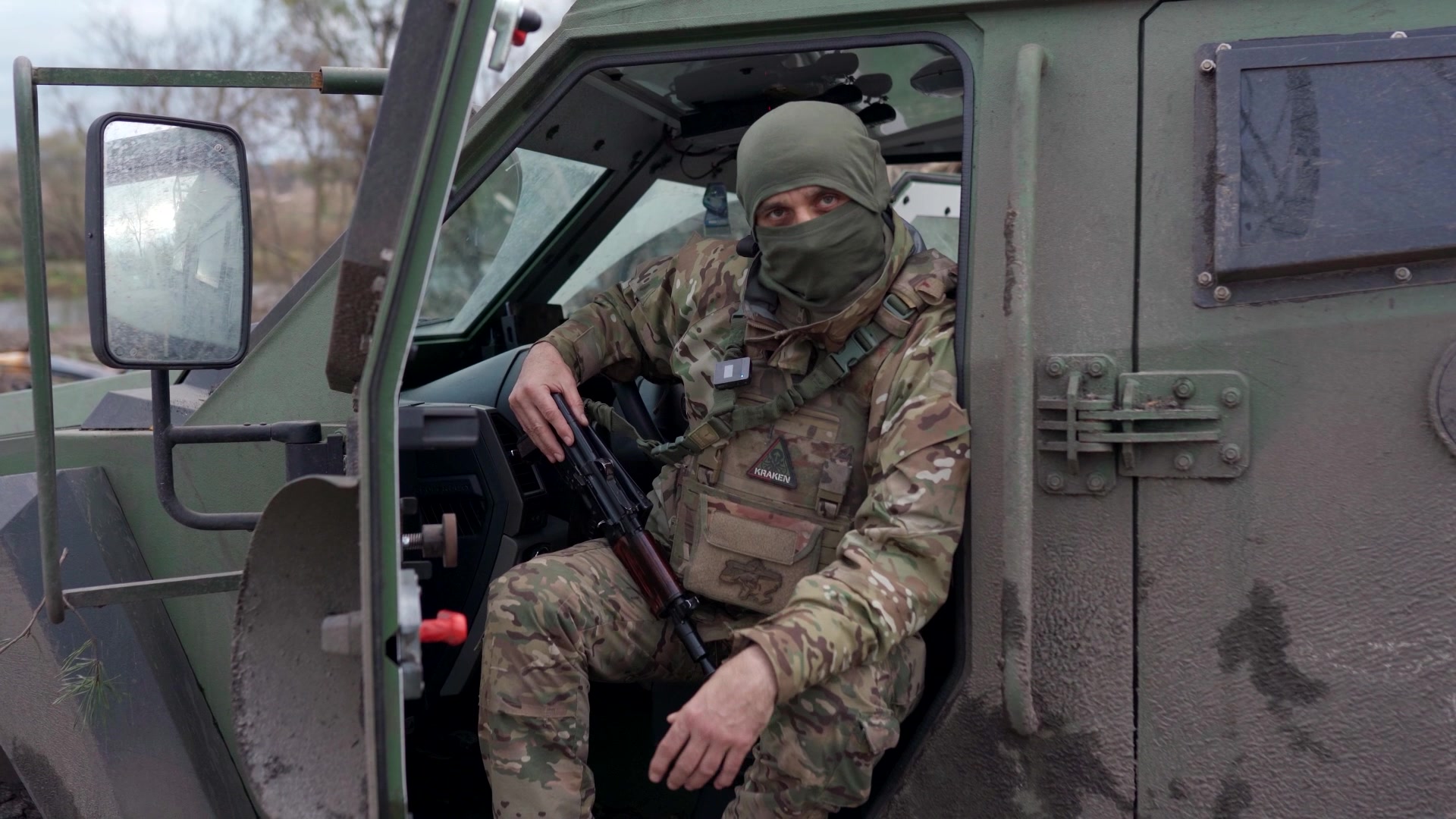 Marat, a driver with the Ukrainian military, sitting in a Roshel Senator in eastern Ukraine.