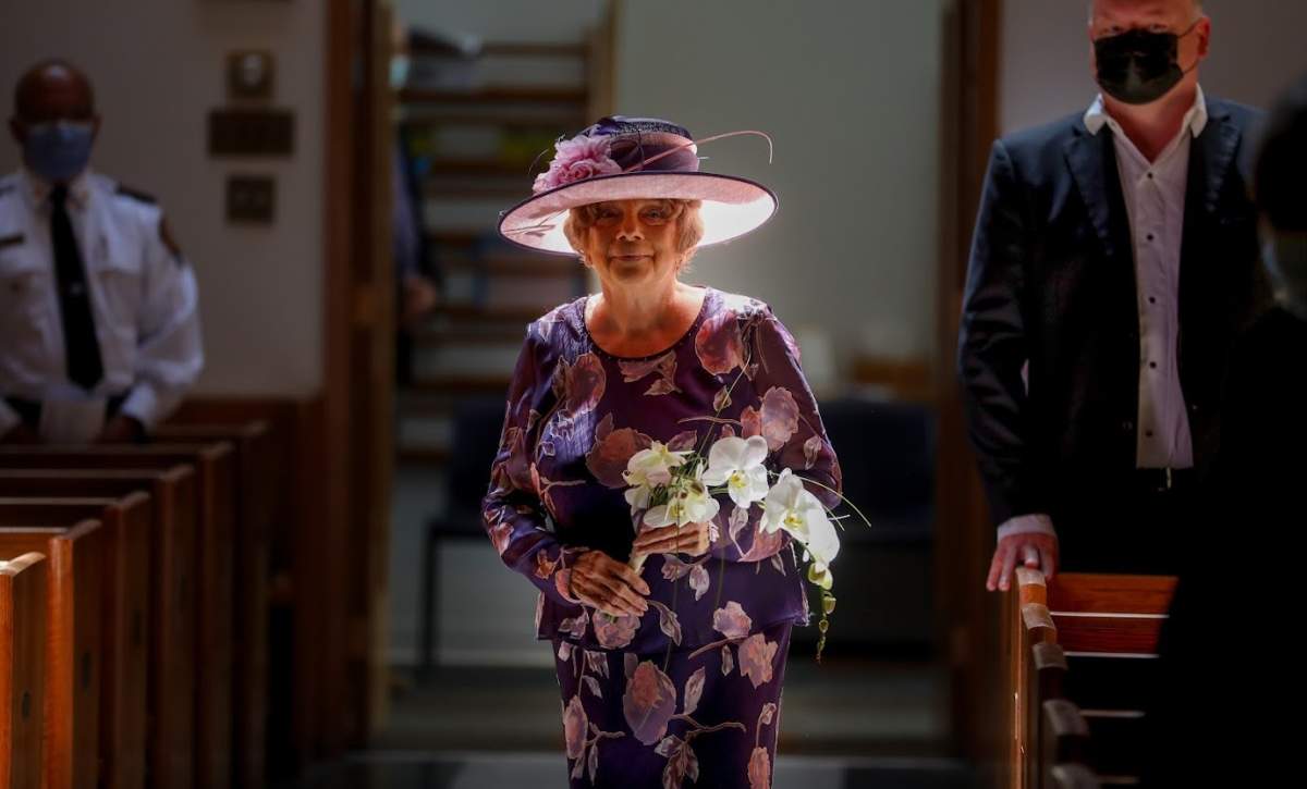 Marvel walks down the aisle during her wedding at Holy Cross Anglican Church in Calgary.