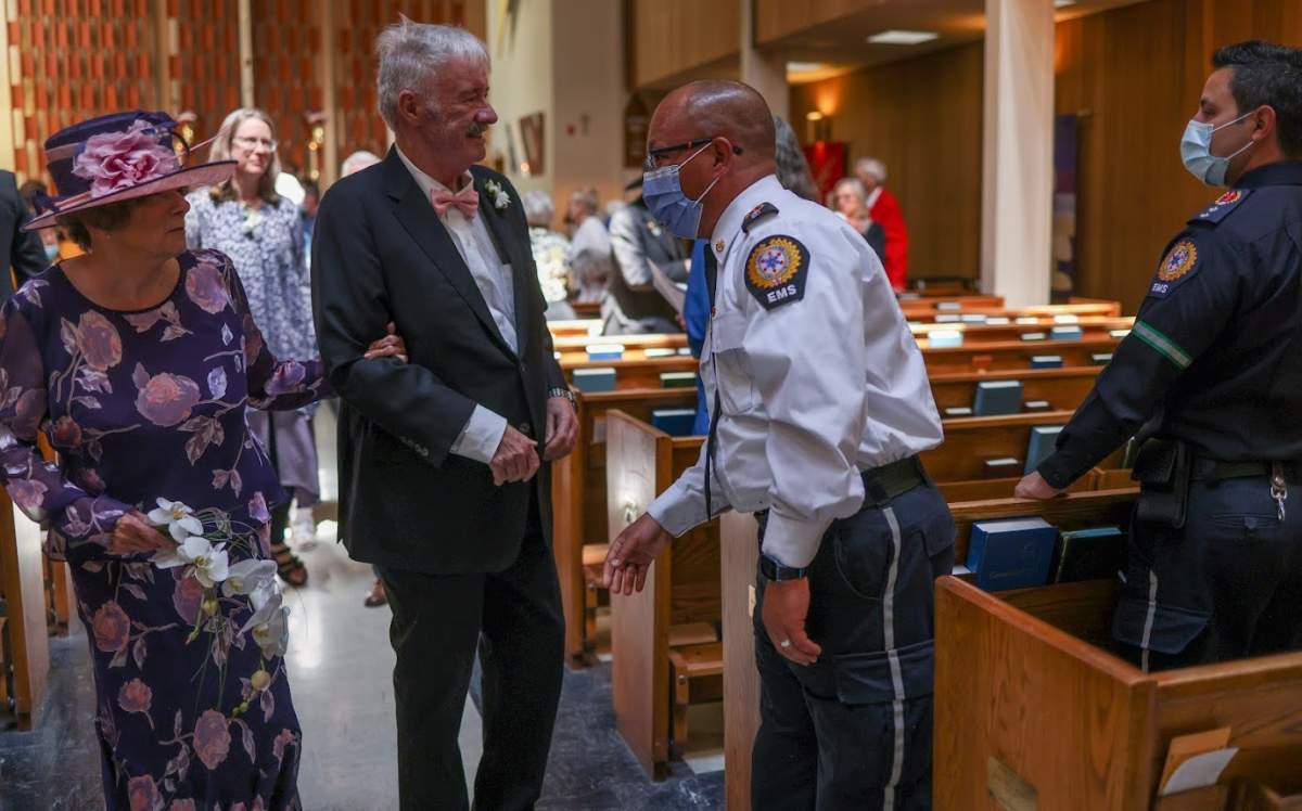 Marvel and her husband walk down the aisle following their wedding at Holy Cross Anglican Church in Calgary.