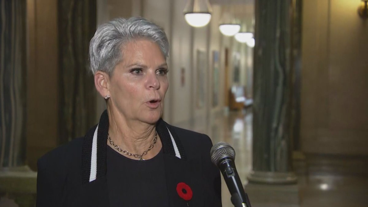 Saskatchewan Public Safety Minister Christine Tell speaks to reporters Tuesday about convicted killer Colin Thatcher's appearance at the Throne Speech.