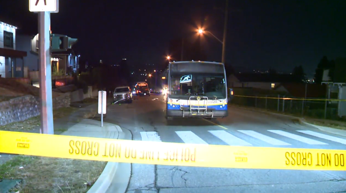 A Metro Vancouver transit bus seen at the site of a fatal pedestrian collision on Tuesday, Nov. 8, 2022. 