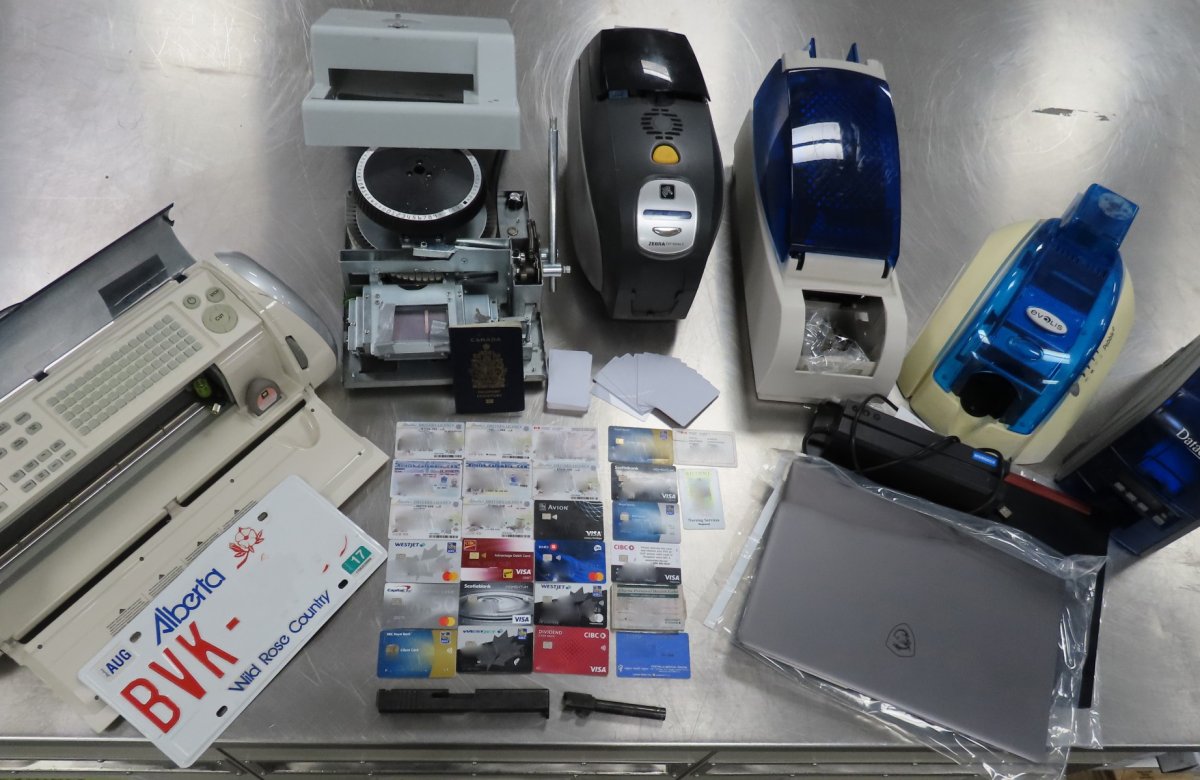 Calgary police officers seized equipment from an identity forgery lab located downtown.