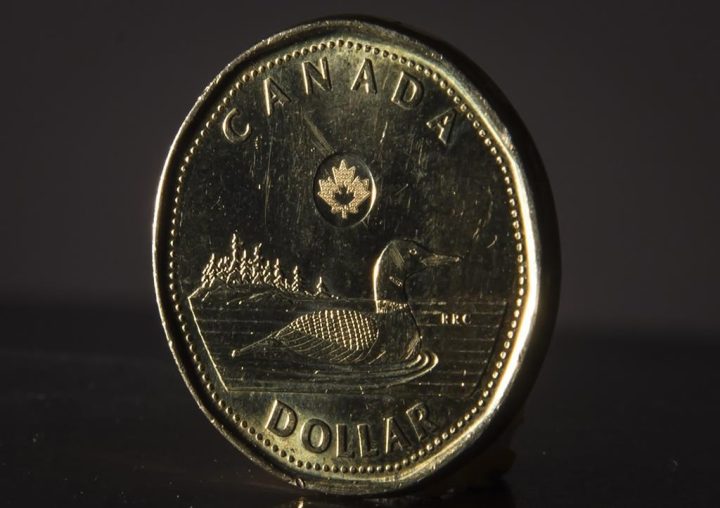 The Canadian dollar coin is pictured in North Vancouver, B.C., Wednesday, May 29, 2019. 