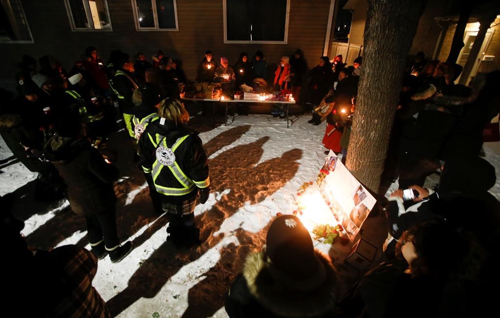 Family and friends of slain women gather at a vigil in Winnipeg, Thursday, Dec. 1, 2022. It was announced that Jeremy Skibicki faces three more charges of first-degree murder. In addition to Rebecca Contois, who was identified earlier, Skibicki has been charged in the deaths of Morgan Beatrice Harris, Marcedes Myran, and an unidentified female. 