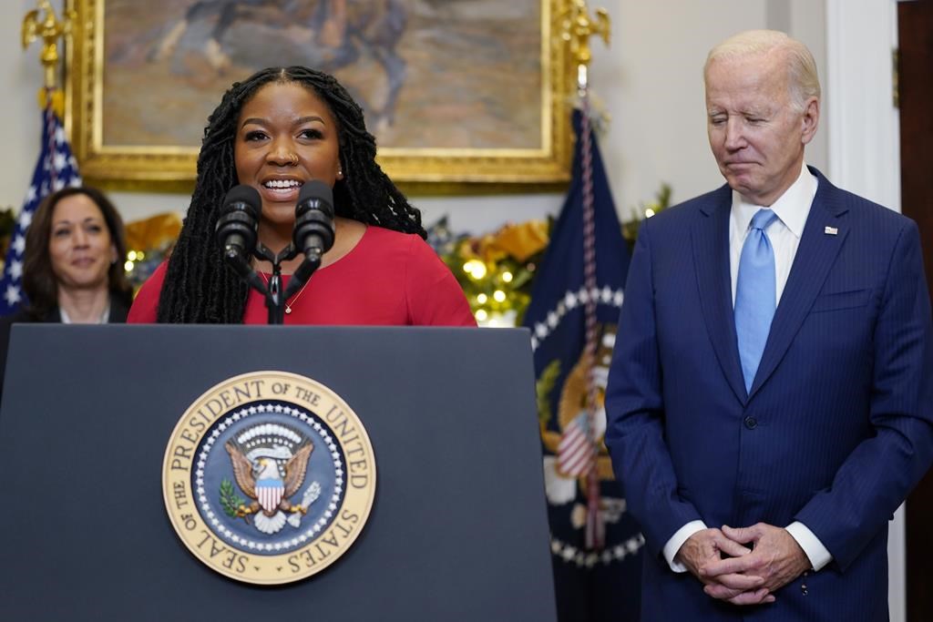 Cherelle Griner, wife of WNBA star Brittney Griner, speaks in the Roosevelt Room of the White House, Thursday, Dec. 8, 2022, in Washington, with President Joe Biden, right, and Vice President Kamala Harris.