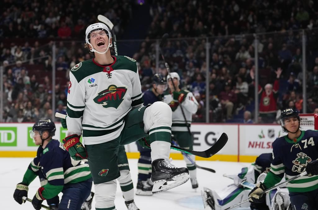 Minnesota Wild's Matt Boldy celebrates his goal against the Vancouver Canucks during the first period of an NHL hockey game in Vancouver, on Saturday, December 10, 2022.