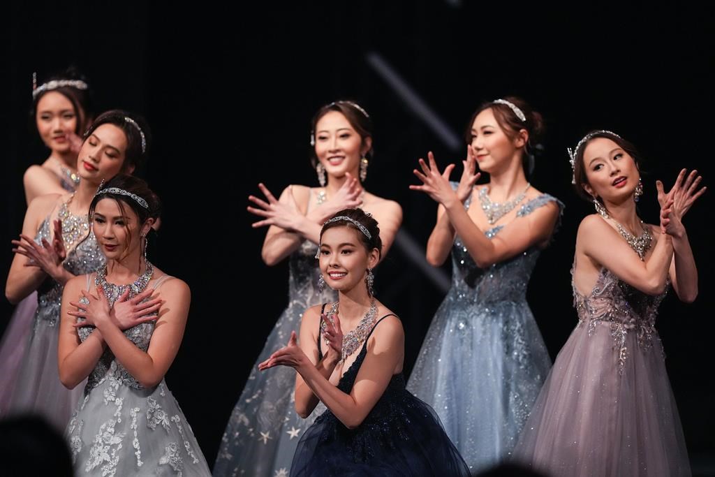 Competitors, including eventual winner Yi Yi Wang, front centre, dance during the Miss Chinese Vancouver Pageant, in Richmond, B.C., on Wednesday, November 30, 2022. The popularity of the 27-year-old pageant is testament to both the ongoing lure of celebrity in Hong Kong and Chinese show business, and what one expert calls the "aura" surrounding Canadian Chinese entertainers across the Pacific. Vancouver has long served as a source of talent for the Hong Kong and mainland Chinese entertainment scenes, and the mutual attraction persists in spite of recent political tensions between Canada and Beijing. THE CANADIAN PRESS/Darryl Dyck.