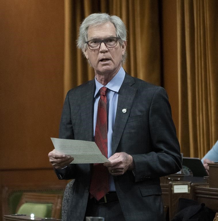 Liberal MP for Winnipeg South Centre Jim Carr rises during Question Period in Ottawa, Thursday, March 24, 2022.