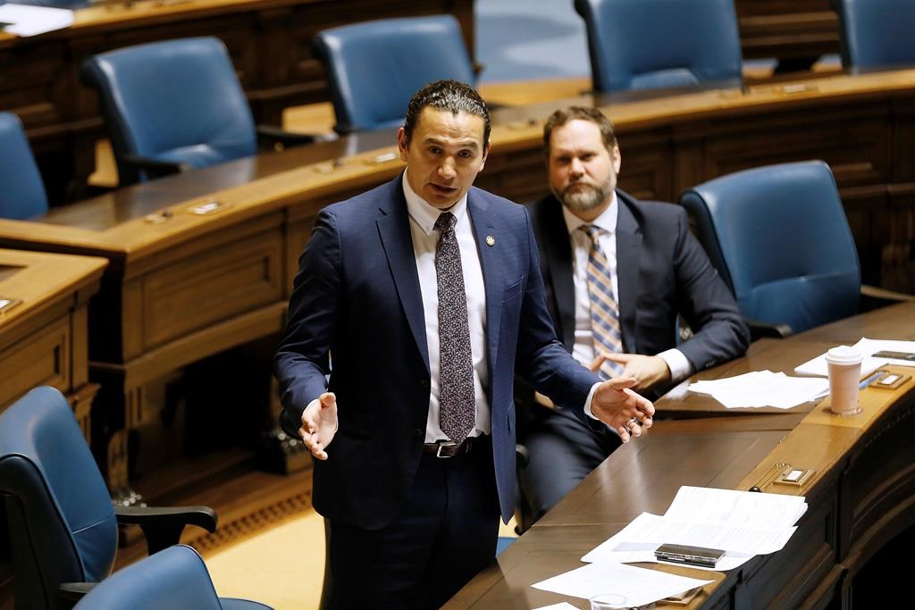 Manitoba NDP Opposition Leader Wab Kinew speaks at the Manitoba legislature in Winnipeg on April 15, 2020. He says he'd like to bring back the annual holiday open house at the legislature if he were to be elected premier.