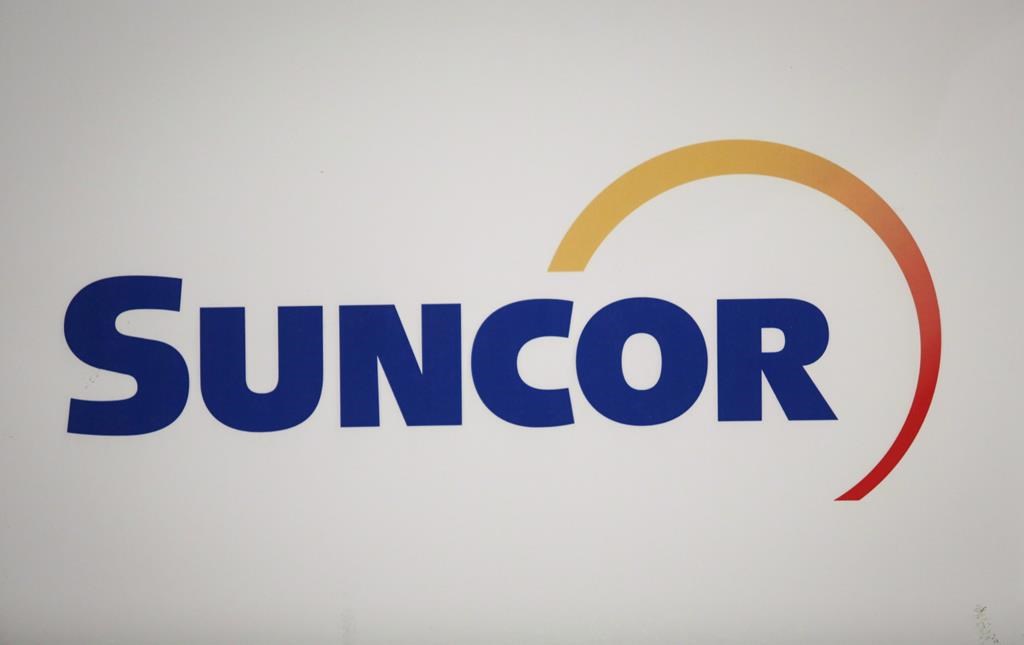A Suncor Energy Inc. logo is shown at the company's annual meeting in Calgary, Thursday, April 27, 2017.