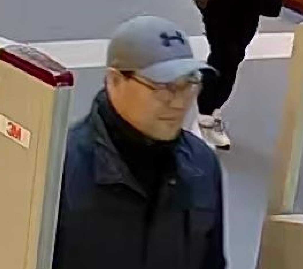 Police say this man is responsible for a recent fraud on the Queen's University campus.