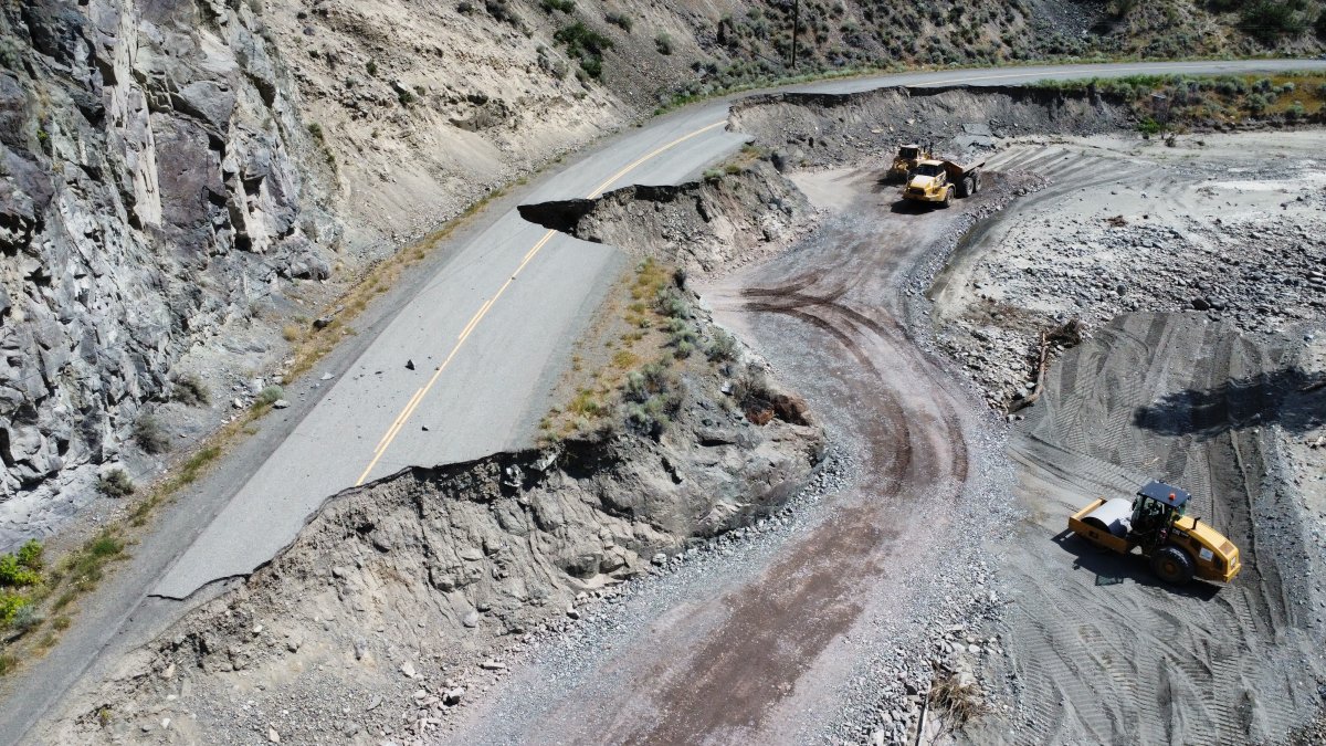 Crews working on Highway 8 in August 2022, months after catastrophic rain and flooding wiped out sections of the highway in November 2021.
