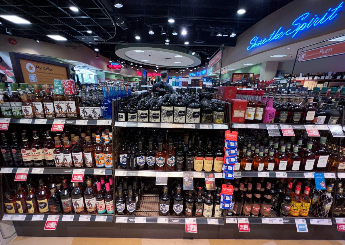 A person shops at a government-run B.C. Liquor Store in Vancouver, on Friday, August 19, 2022. 