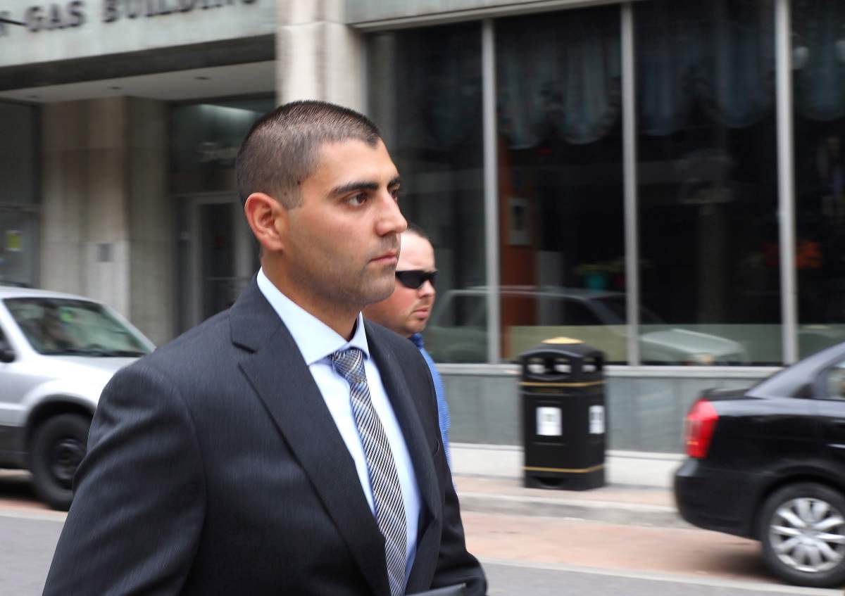 Peter Khill, charged with second-degree murder, leaves court in Hamilton on Tuesday, June 12, 2018.