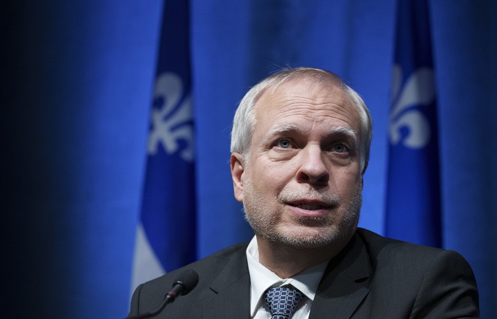 Quebec public health director Dr. Luc Boileau responds to a question during a news conference in Montreal, Tuesday, Jan. 11, 2022.