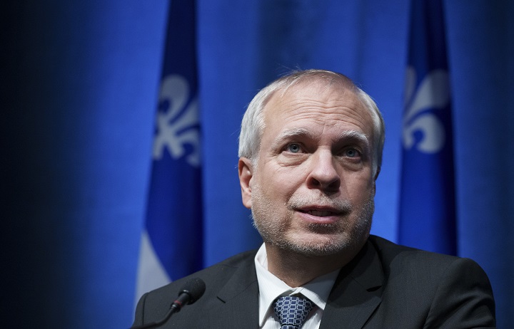 Quebec public health director Dr. Luc Boileau responds to a question during a news conference in Montreal, Tuesday, Jan. 11, 2022.