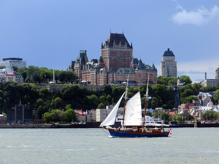 Quebec City's iconic Fairmont Le Chateau Frontenac dominates the city skyline from the ferry crossing the St. Lawrence River, Aug. 15, 2015. Quebec City wants to host the next season of the popular HBO series "The White Lotus" and the region's tourism arm is aiming to make it happen. 